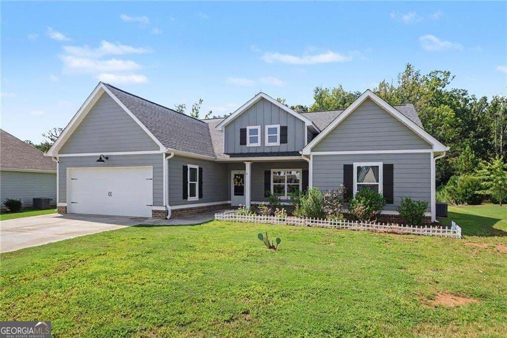 4 bedroom, 2 bathroom, 1,911 sq ft single family residence for sale at 119 Springwood Drive, Carrollton, GA 30117 — photo 2