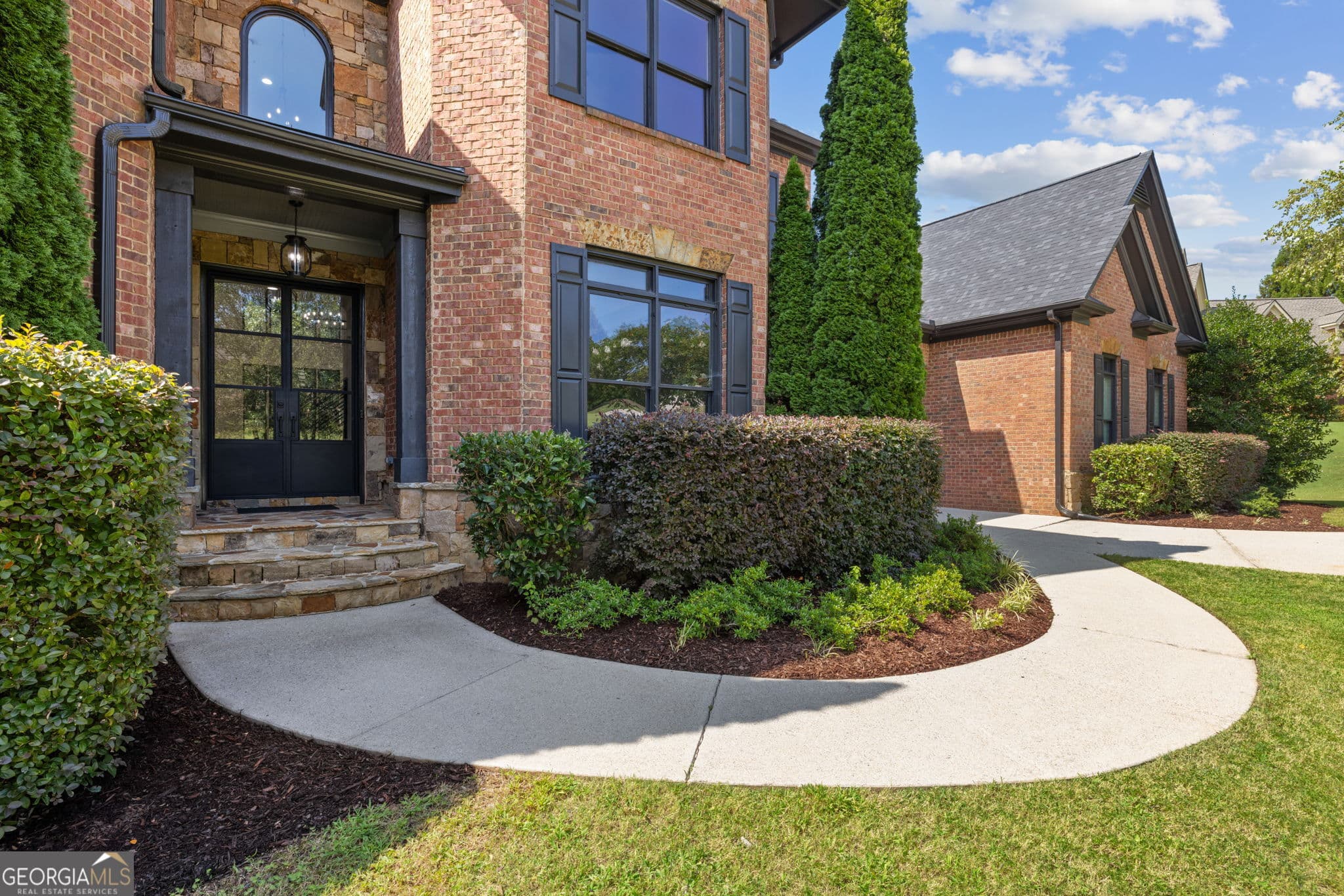 6 bedroom, 6.5 bathroom, 8,116 sq ft single family residence for sale at 4824 Deer Creek Court, Flowery Branch, GA 30542 — photo 2