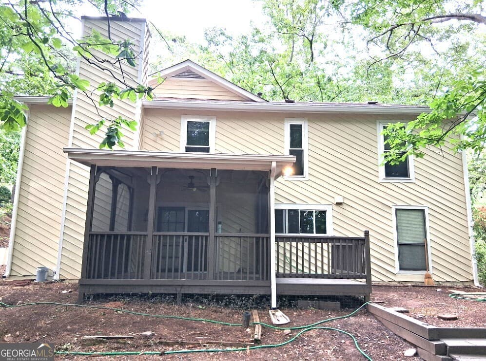 4 bedroom, 2.5 bathroom, 2,248 sq ft single family residence for sale at 8580 Colony Club Drive, Johns Creek, GA 30022 — photo 3
