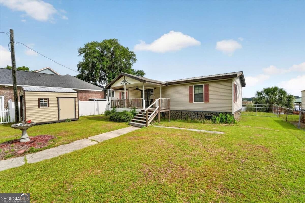 3 bedroom, 2 bathroom, 1,608 sq ft manufactured home,single family residence for sale at 535 E 1St Street, Midway, GA 31320 — photo 3