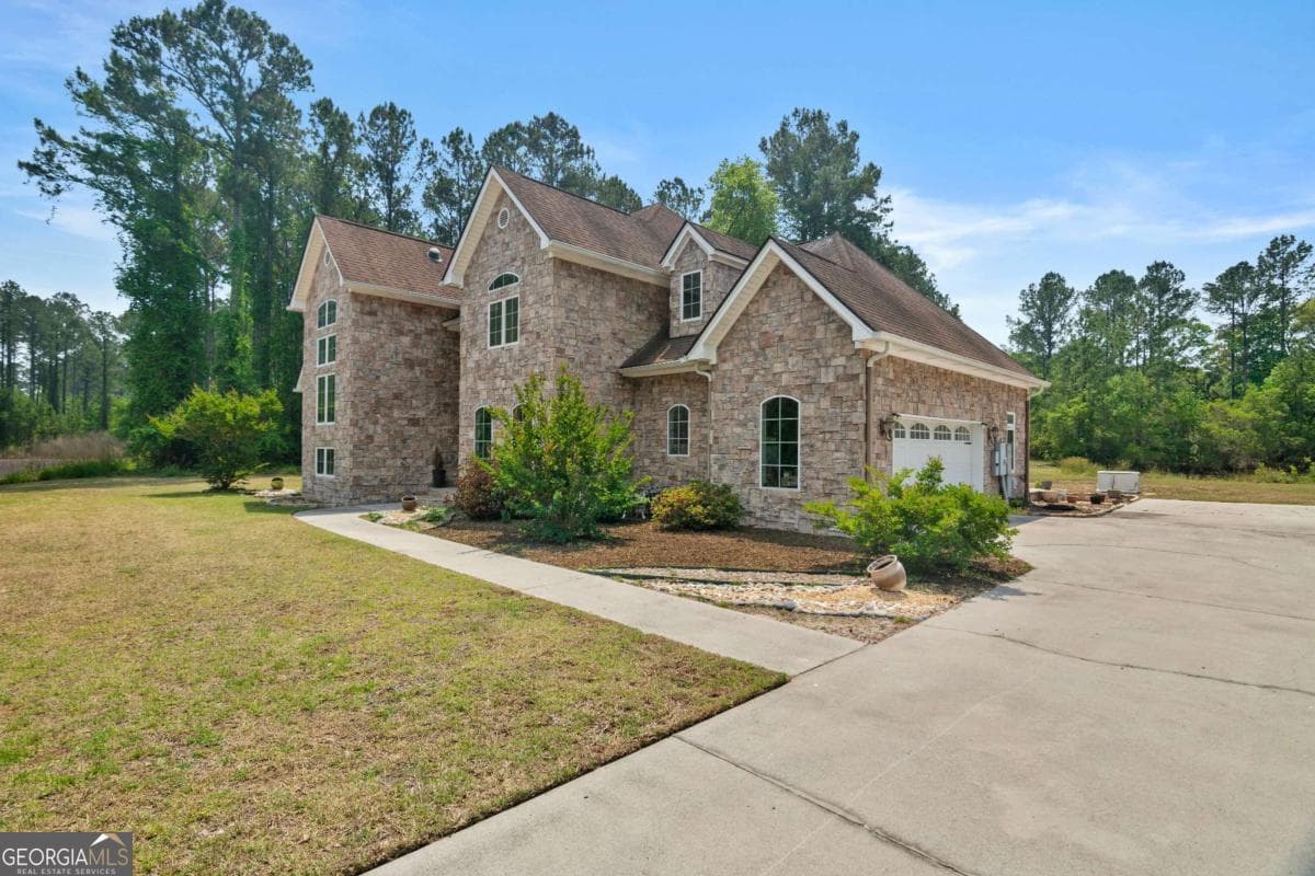4 bedroom, 3.5 bathroom, 3,018 sq ft single family residence for sale at 1198 Fiddlers Cove, Townsend, GA 31331 — photo 3