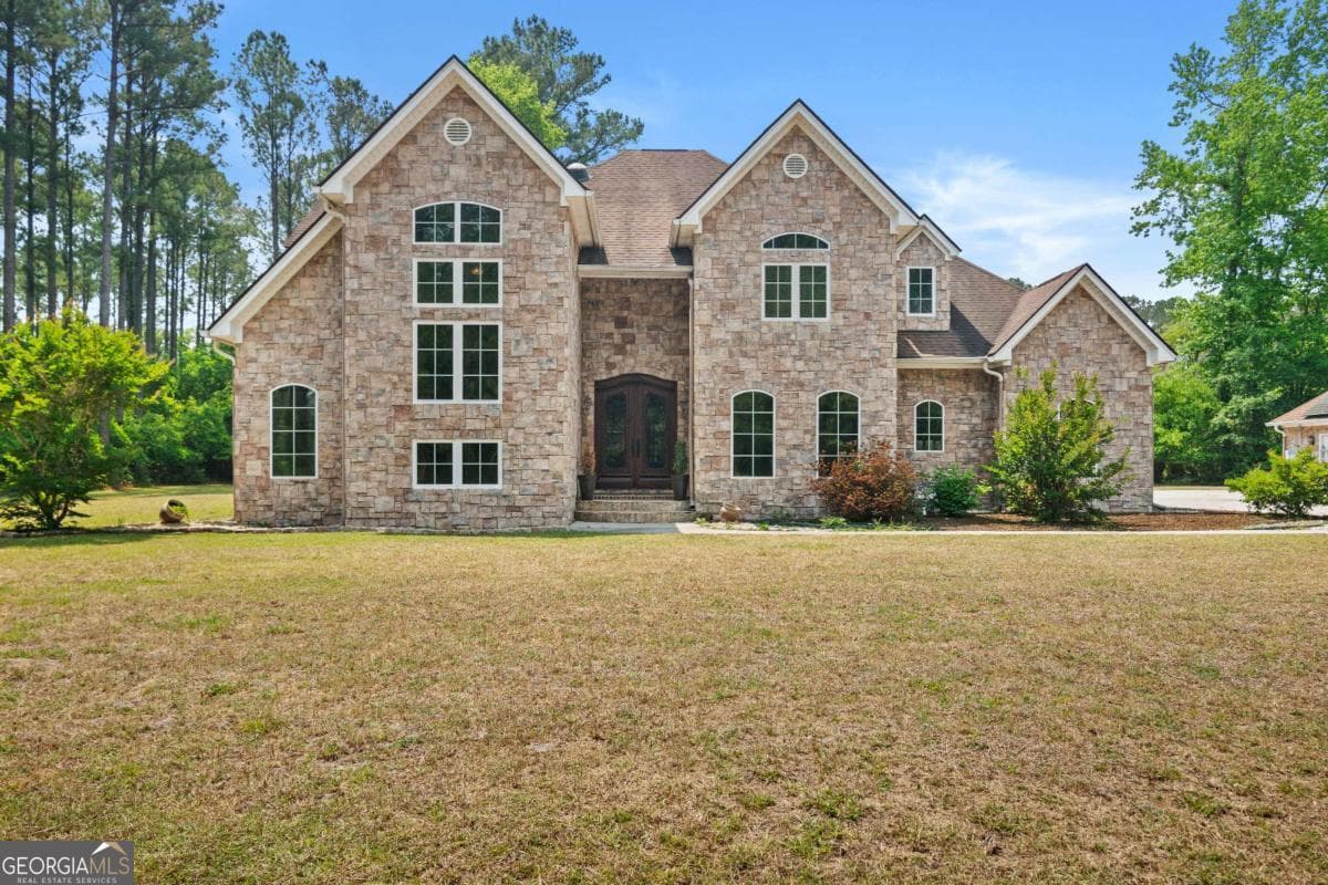 4 bedroom, 3.5 bathroom, 3,018 sq ft single family residence for sale at 1198 Fiddlers Cove, Townsend, GA 31331 — photo 1 of 61
