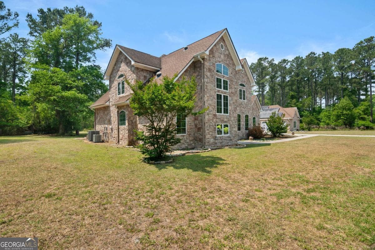 4 bedroom, 3.5 bathroom, 3,018 sq ft single family residence for sale at 1198 Fiddlers Cove, Townsend, GA 31331 — photo 4