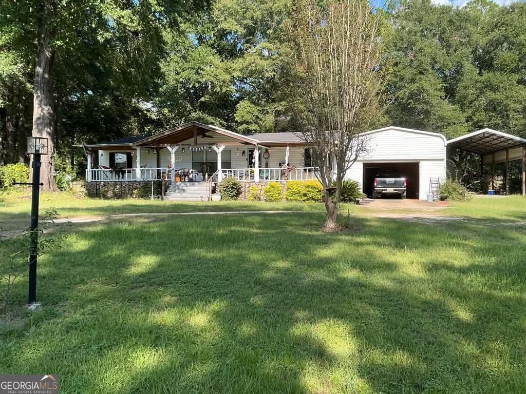 3 bedroom, 2 bathroom, 1,289 sq ft manufactured home,single family residence for sale at 27 CoRd, Eufaula, AL 36027 — photo 2
