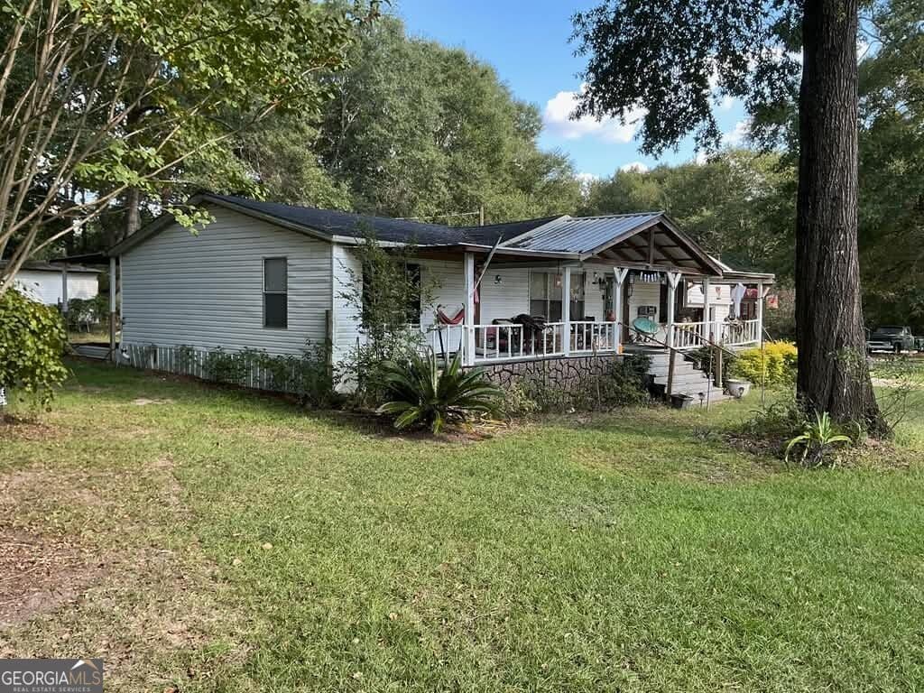 3 bedroom, 2 bathroom, 1,289 sq ft manufactured home,single family residence for sale at 27 CoRd, Eufaula, AL 36027 — photo 3