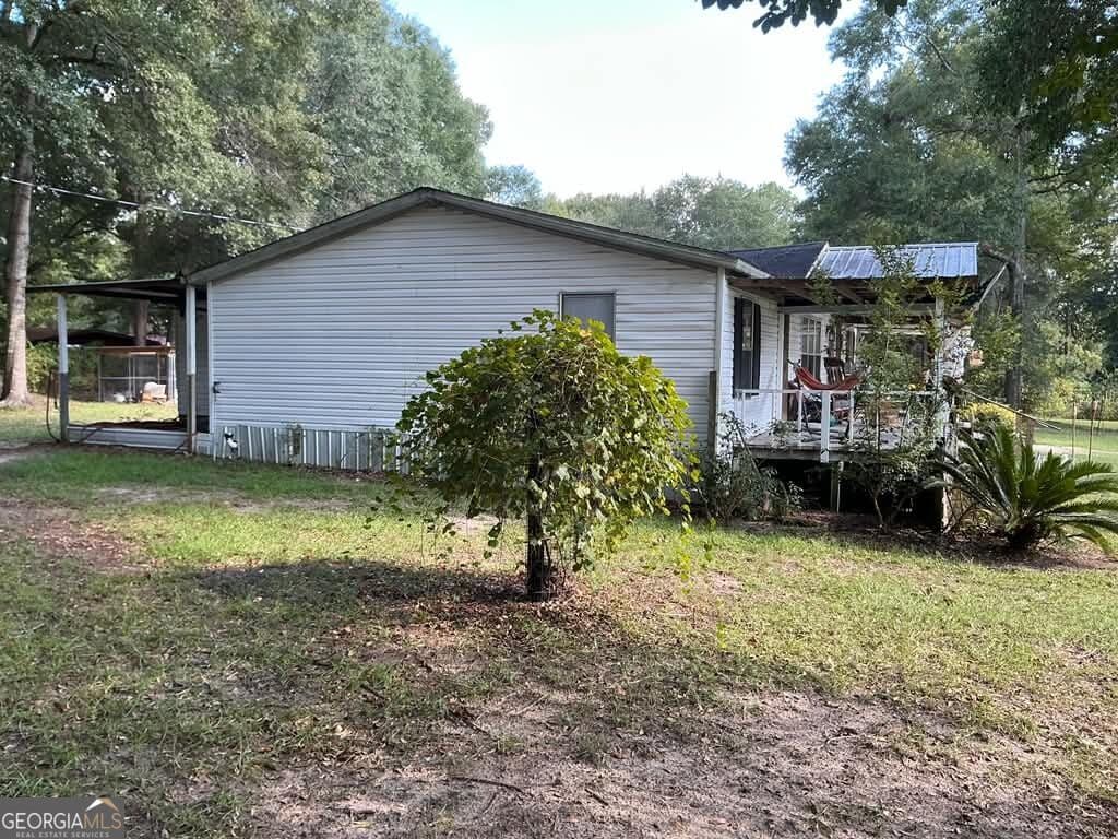 3 bedroom, 2 bathroom, 1,289 sq ft manufactured home,single family residence for sale at 27 CoRd, Eufaula, AL 36027 — photo 4