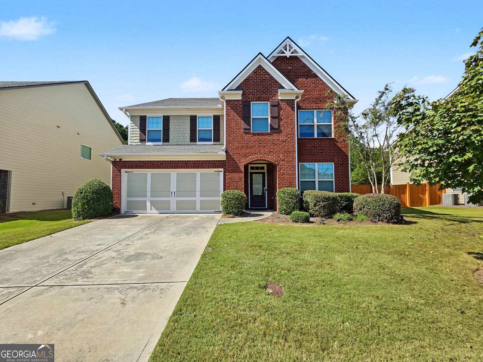 4 bedroom, 3 bathroom, 3,163 sq ft single family residence for sale at 5620 Shiloh Woods Drive, Cumming, GA 30040 — photo 2