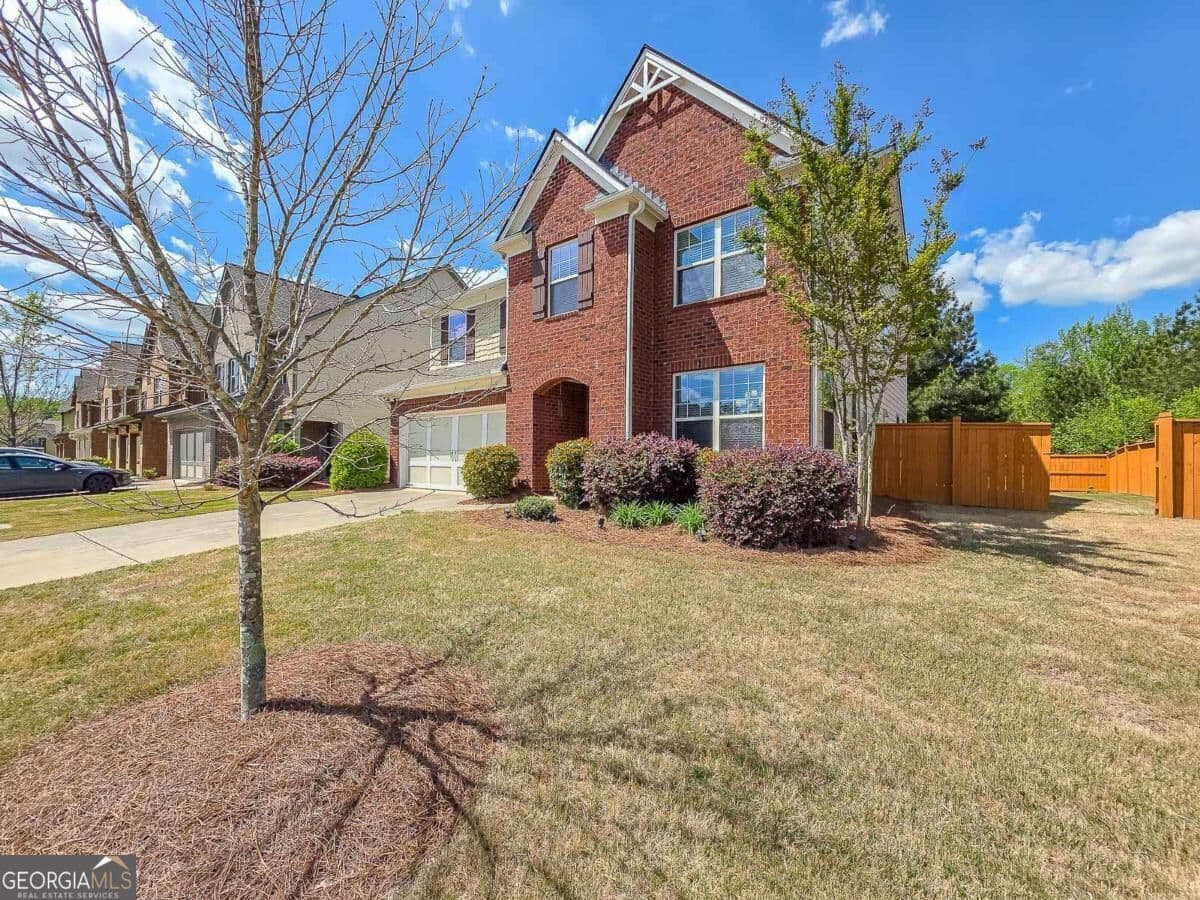 4 bedroom, 3 bathroom, 3,163 sq ft single family residence for sale at 5620 Shiloh Woods Drive, Cumming, GA 30040 — photo 3