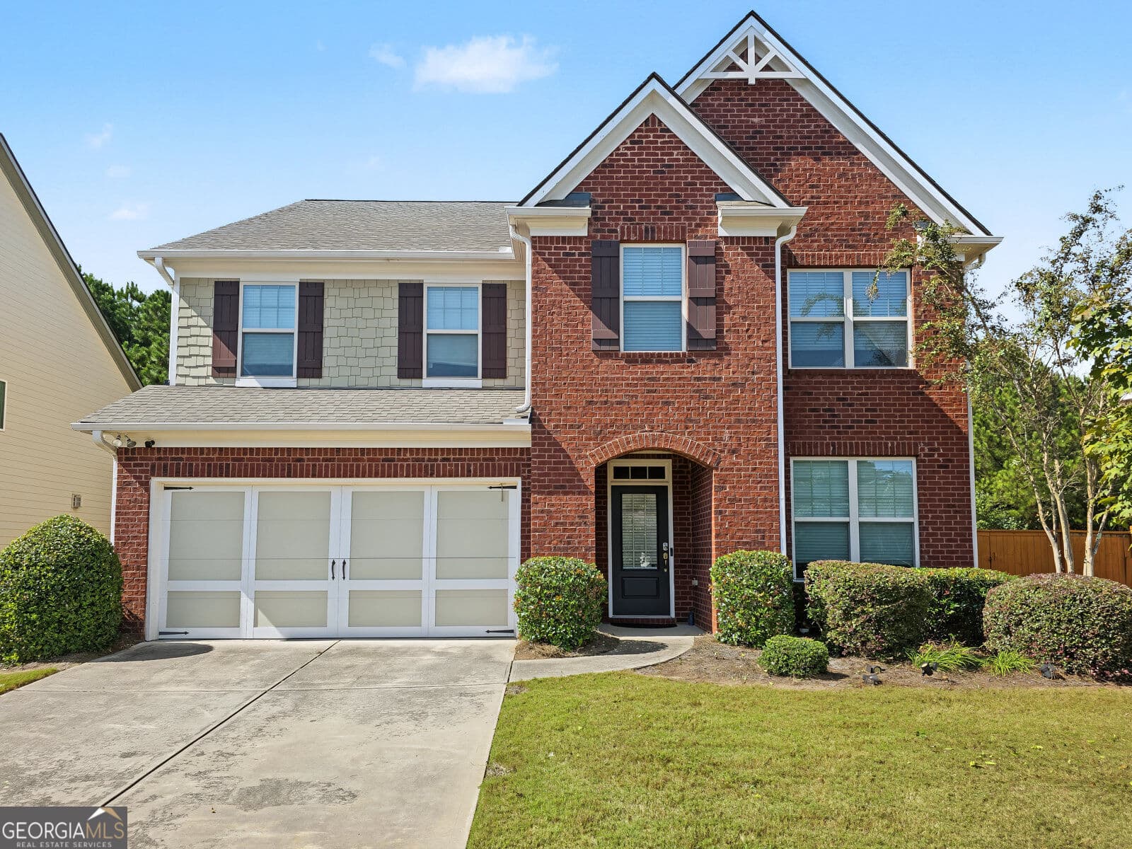 4 bedroom, 3 bathroom, 3,163 sq ft single family residence for sale at 5620 Shiloh Woods Drive, Cumming, GA 30040 — photo 1 of 52