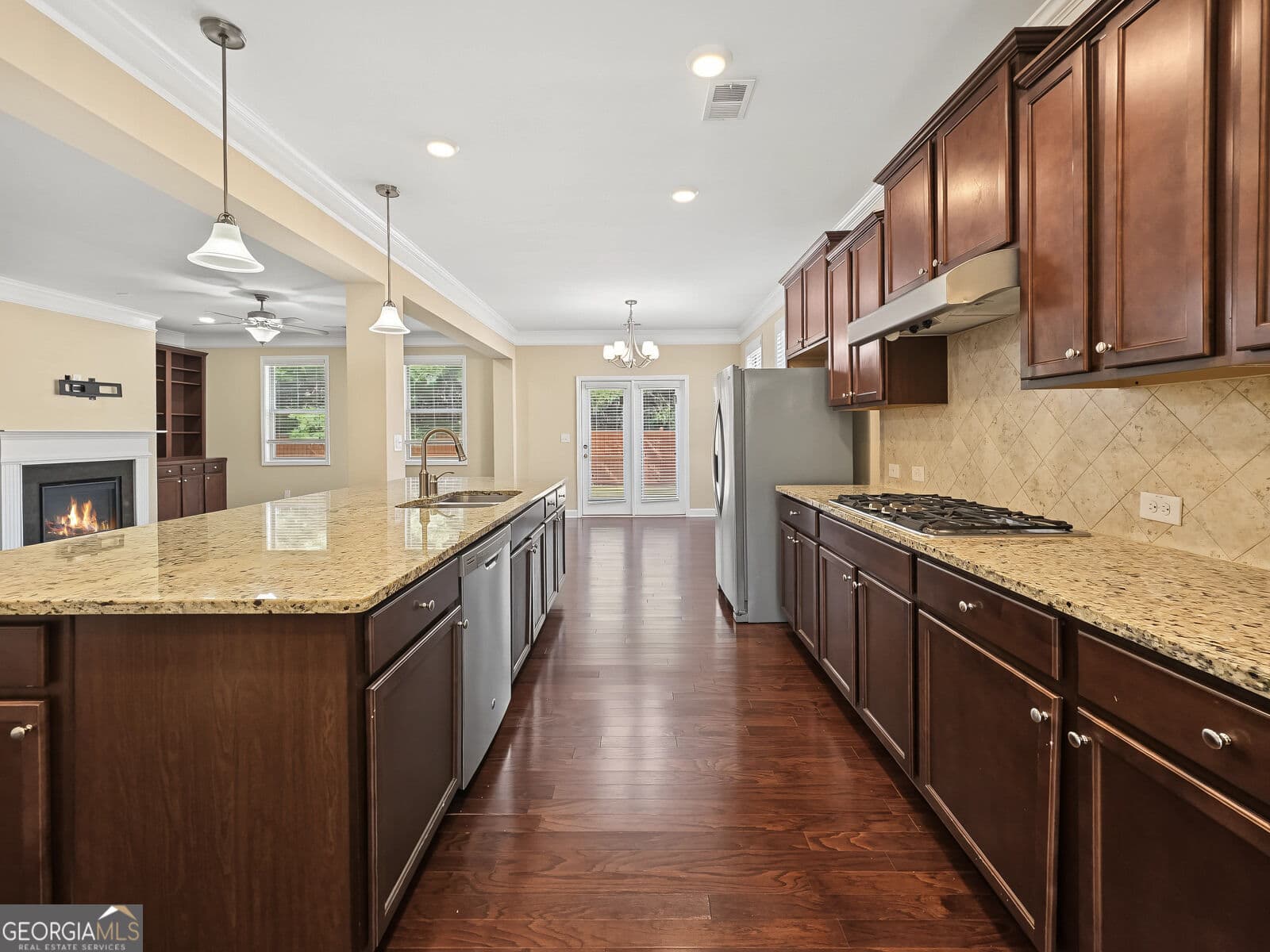 4 bedroom, 3 bathroom, 3,163 sq ft single family residence for sale at 5620 Shiloh Woods Drive, Cumming, GA 30040 — photo 9
