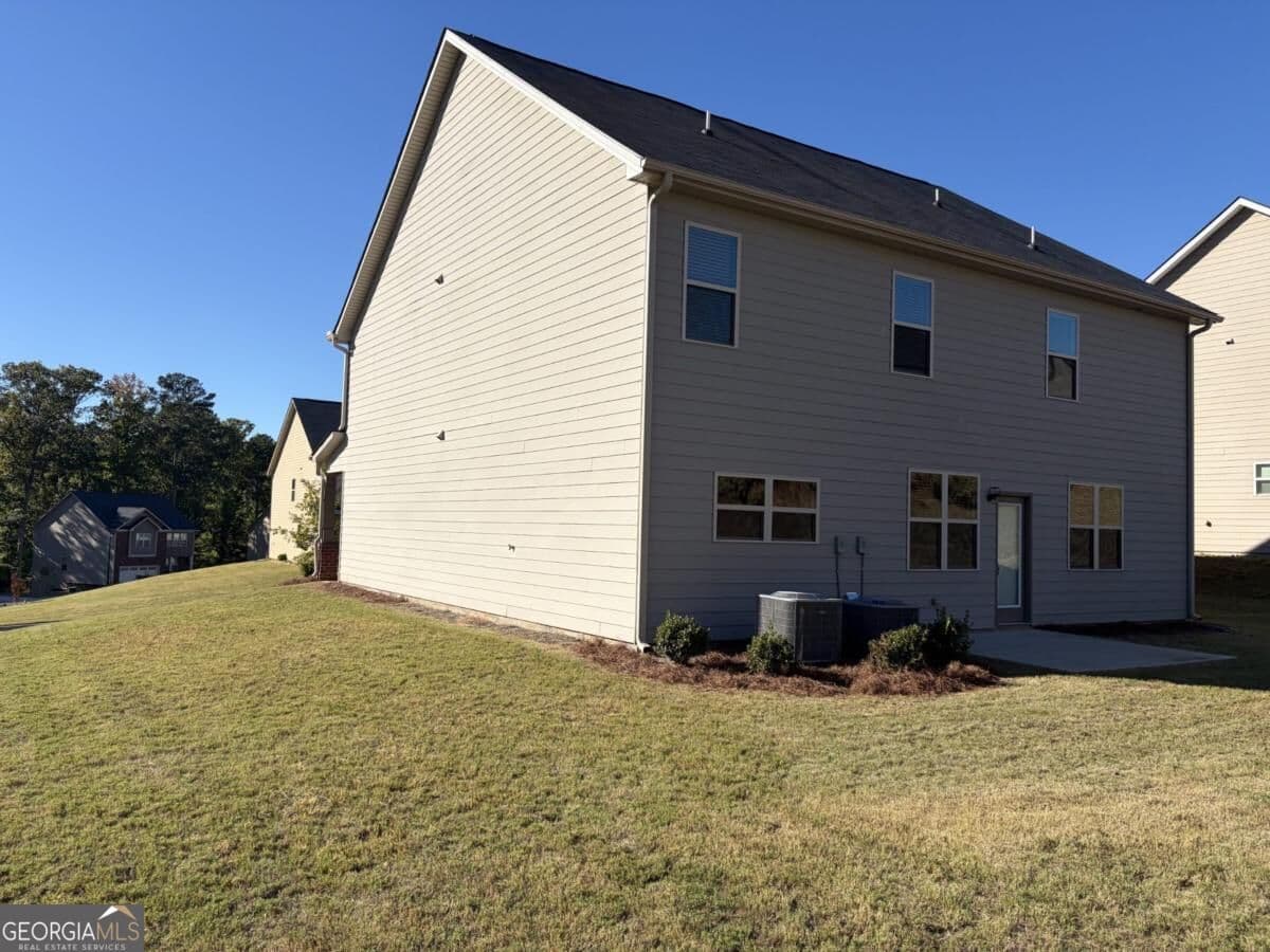 5 bedroom, 3 bathroom, 2,670 sq ft single family residence for sale at 1736 Middle Brook Drive, Conyers, GA 30012 — photo 2