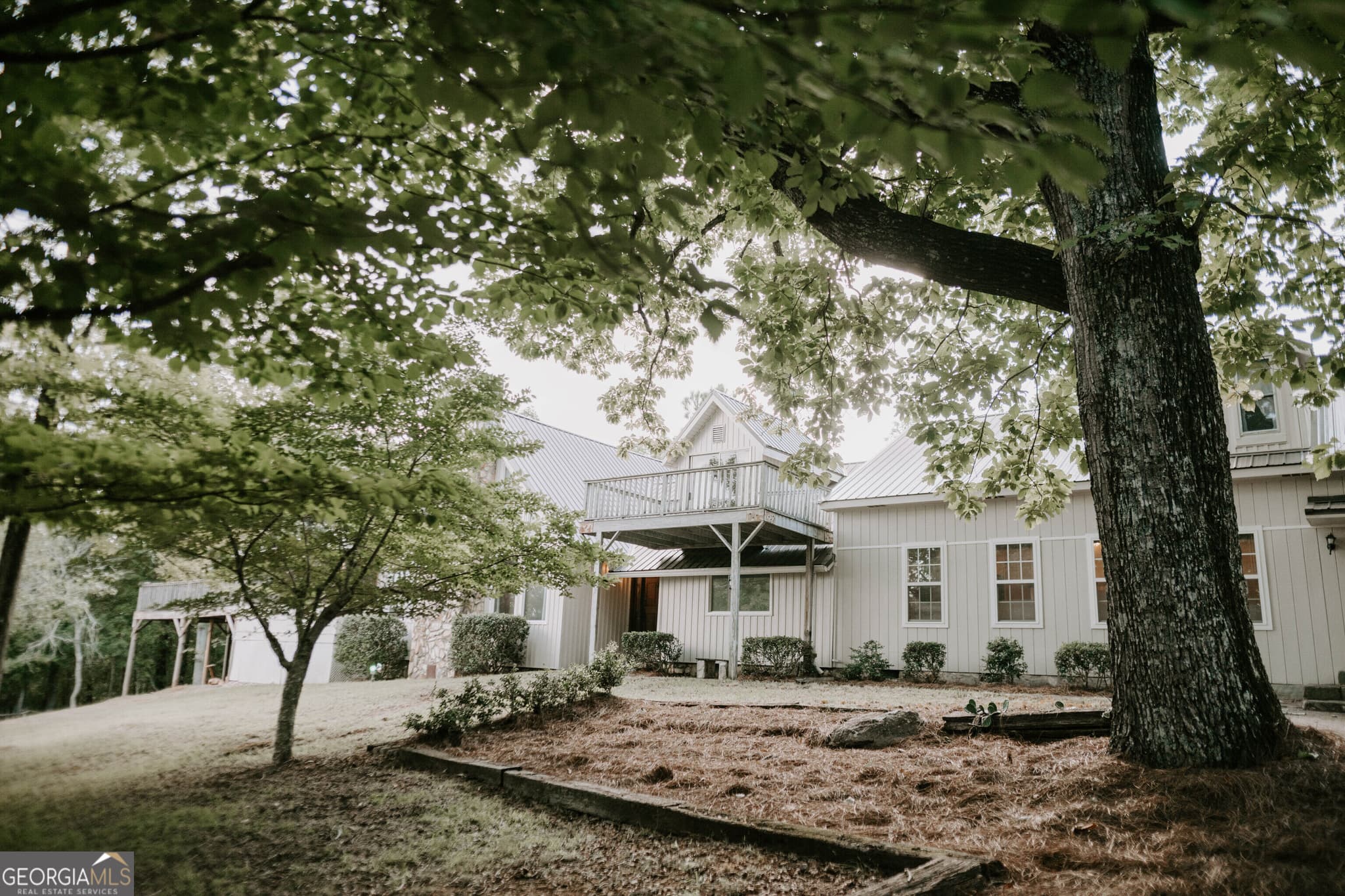 3 bedroom, 2 bathroom, 3,970 sq ft single family residence for sale at 709 Day Road, Meansville, GA 30256 — photo 2