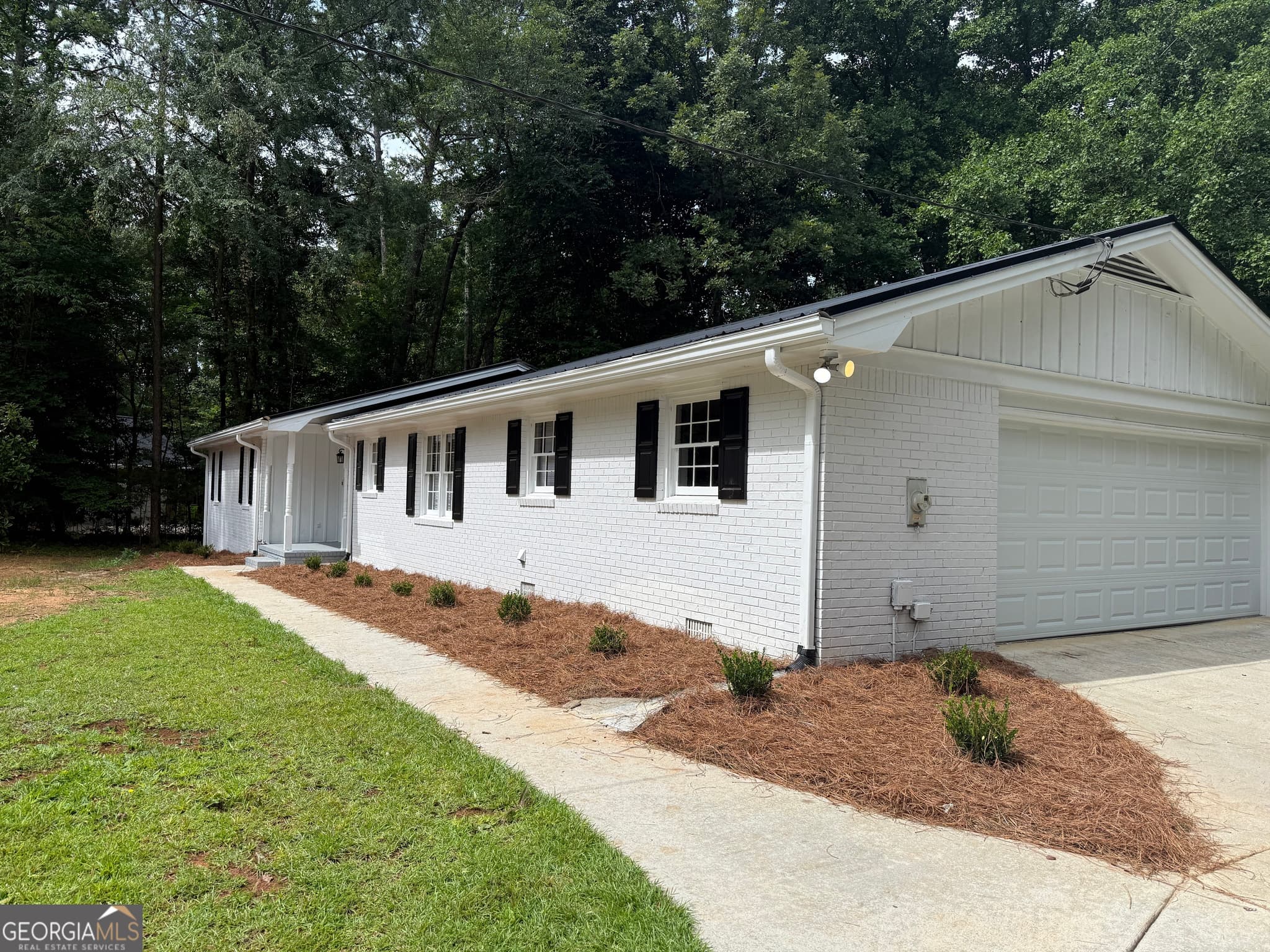 3 bedroom, 2 bathroom, 3,480 sq ft single family residence for sale at 1912 Wildwood Court, Conyers, GA 30094 — photo 2
