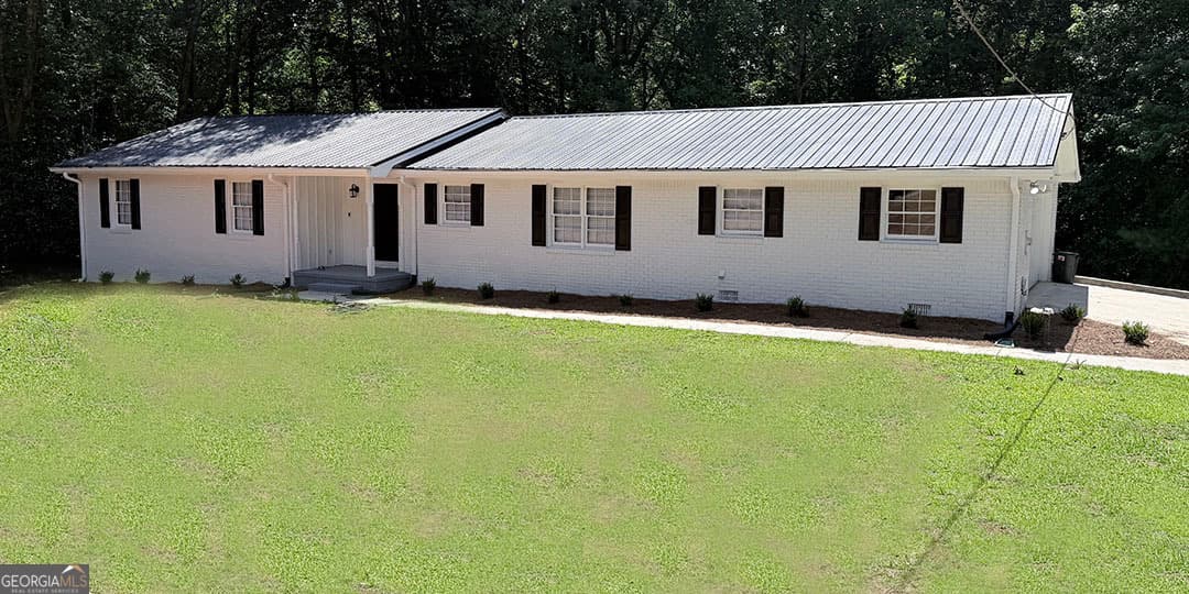 3 bedroom, 2 bathroom, 3,480 sq ft single family residence for sale at 1912 Wildwood Court, Conyers, GA 30094 — photo 1 of 53