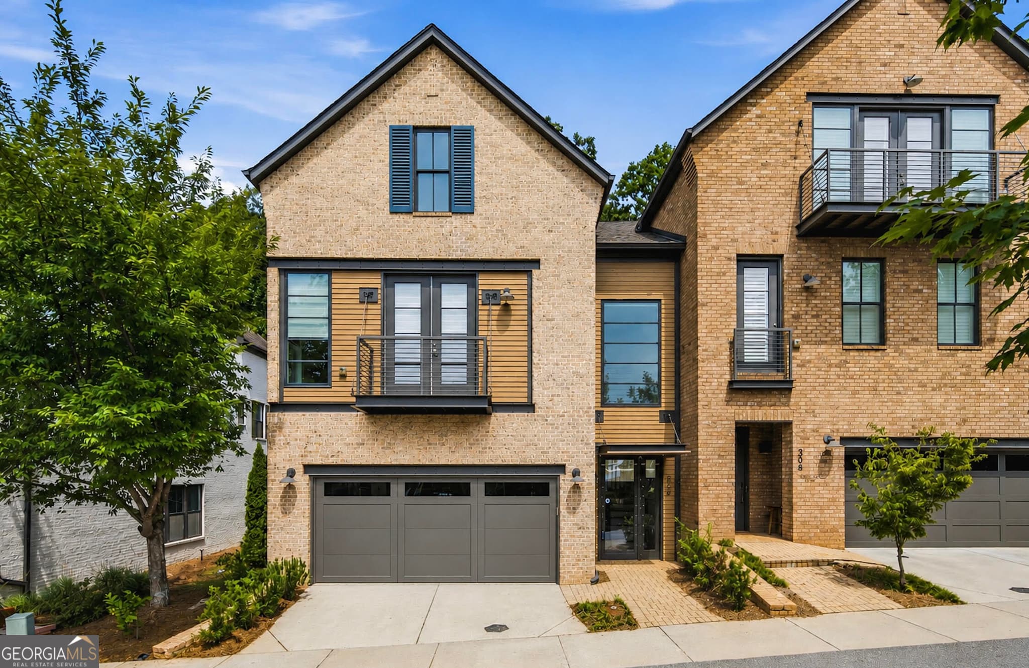 3 bedroom, 3.5 bathroom, 3,563 sq ft townhouse for sale at 312 Sonatina Terrace, Alpharetta, GA 30009