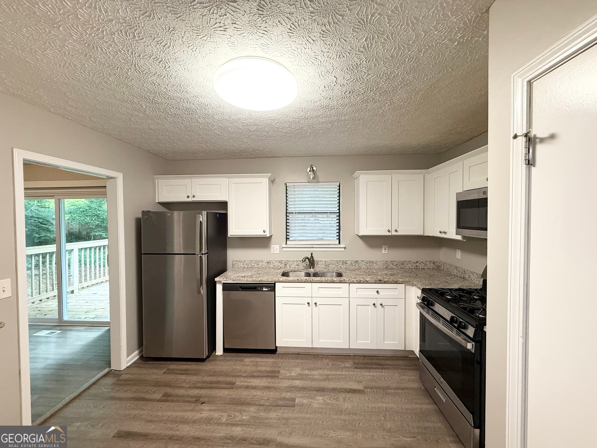 3 bedroom, 2 bathroom, 1,296 sq ft single family residence for sale at 80 Mill Lane, Dallas, GA 30157 — photo 4