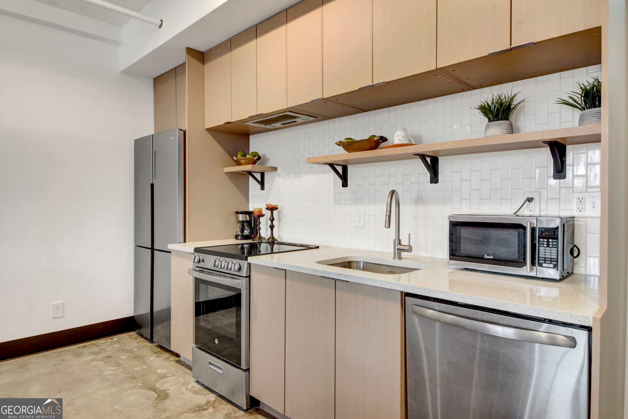 1 bedroom, 1 bathroom, 587 sq ft condominium for sale at 1805 Harvard Avenue 305, College Park, GA 30337 — photo 9