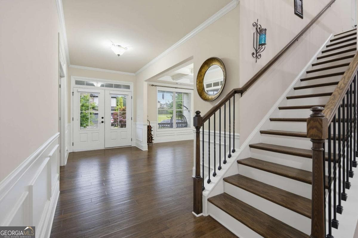 6 bedroom, 5 bathroom, 6,100 sq ft single family residence for sale at 4090 Tobiano Trail, Cumming, GA 30040 — photo 7