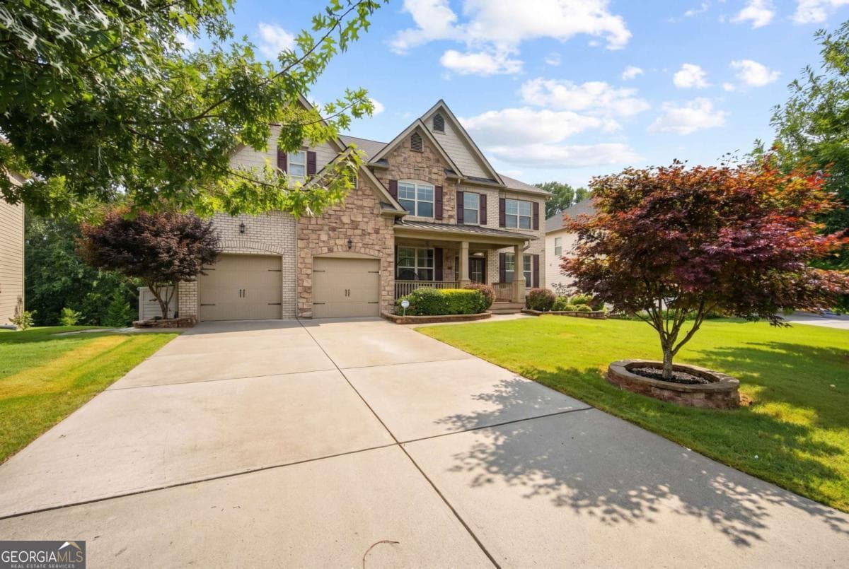 6 bedroom, 5 bathroom, 6,100 sq ft single family residence for sale at 4090 Tobiano Trail, Cumming, GA 30040 — photo 3
