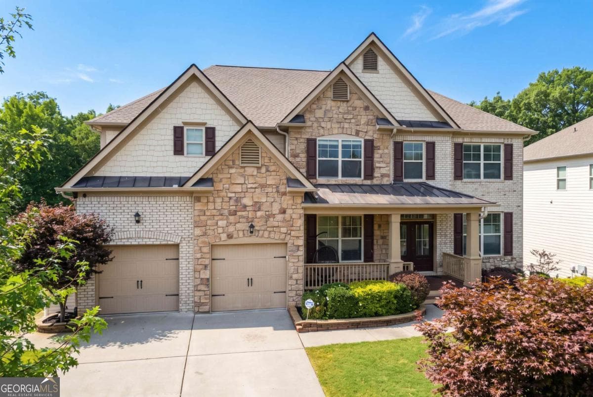 6 bedroom, 5 bathroom, 6,100 sq ft single family residence for sale at 4090 Tobiano Trail, Cumming, GA 30040 — photo 1 of 61