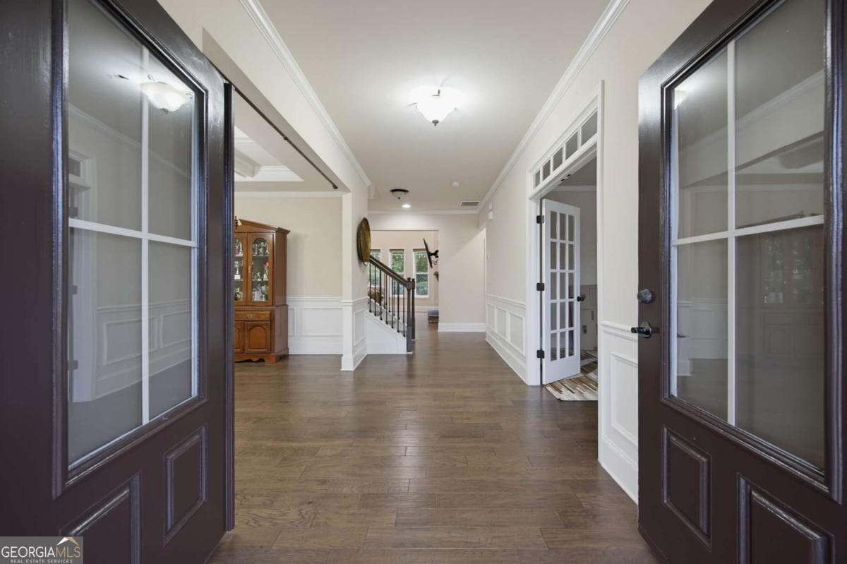 6 bedroom, 5 bathroom, 6,100 sq ft single family residence for sale at 4090 Tobiano Trail, Cumming, GA 30040 — photo 5