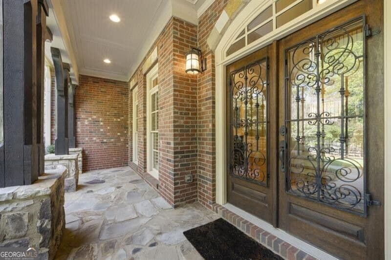 5 bedroom, 6 bathroom, 6,440 sq ft single family residence for sale at 225 Skyridge Drive, Atlanta, GA 30350 — photo 2