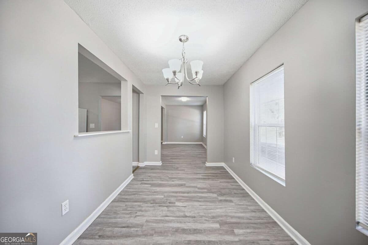 4 bedroom, 2 bathroom, 1,344 sq ft single family residence for sale at 1367 Railroad Avenue, Sugar Hill, GA 30518 — photo 6