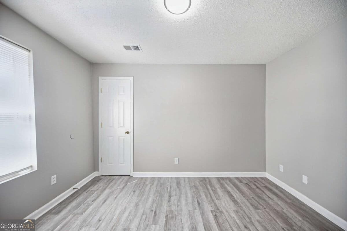 4 bedroom, 2 bathroom, 1,344 sq ft single family residence for sale at 1367 Railroad Avenue, Sugar Hill, GA 30518 — photo 10