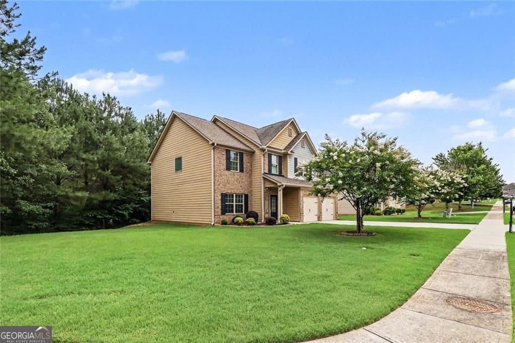 4 bedroom, 2.5 bathroom single family residence for sale at 2127 Farmdale Court, Conyers, GA 30012 — photo 2