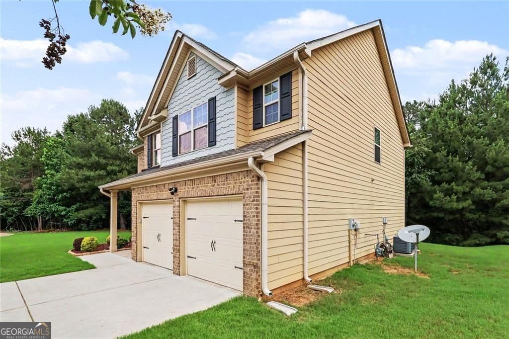 4 bedroom, 2.5 bathroom single family residence for sale at 2127 Farmdale Court, Conyers, GA 30012 — photo 3