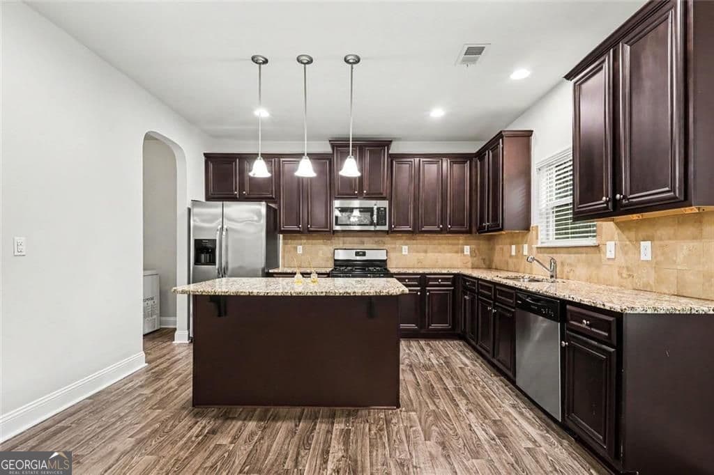 4 bedroom, 2.5 bathroom single family residence for sale at 2127 Farmdale Court, Conyers, GA 30012 — photo 9