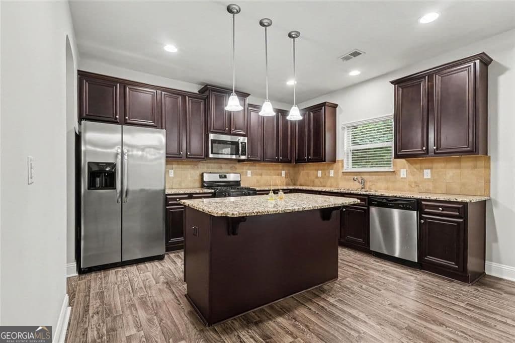 4 bedroom, 2.5 bathroom single family residence for sale at 2127 Farmdale Court, Conyers, GA 30012 — photo 8