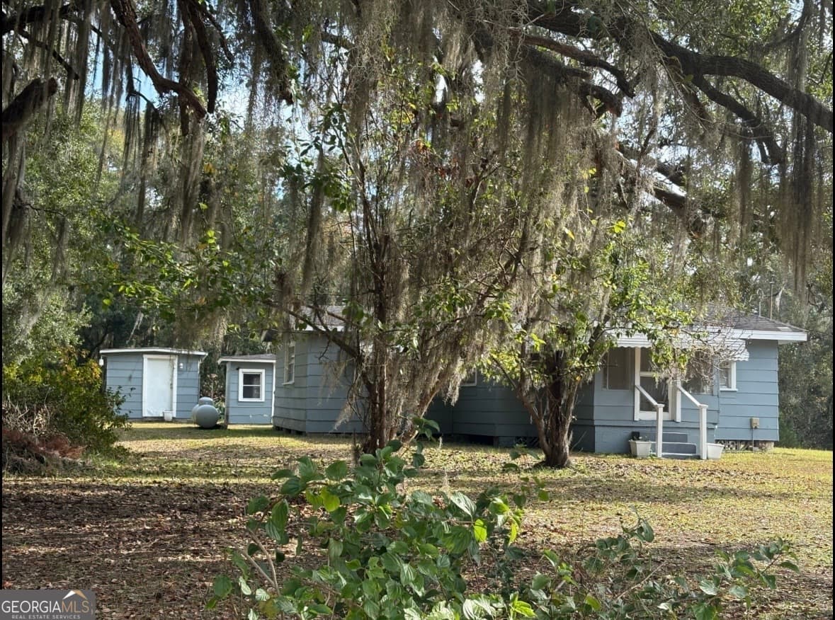 4 bedroom, 1 bathroom, 1,210 sq ft single family residence for sale at 11817 Ga Highway 99, Darien, GA 31305 — photo 2