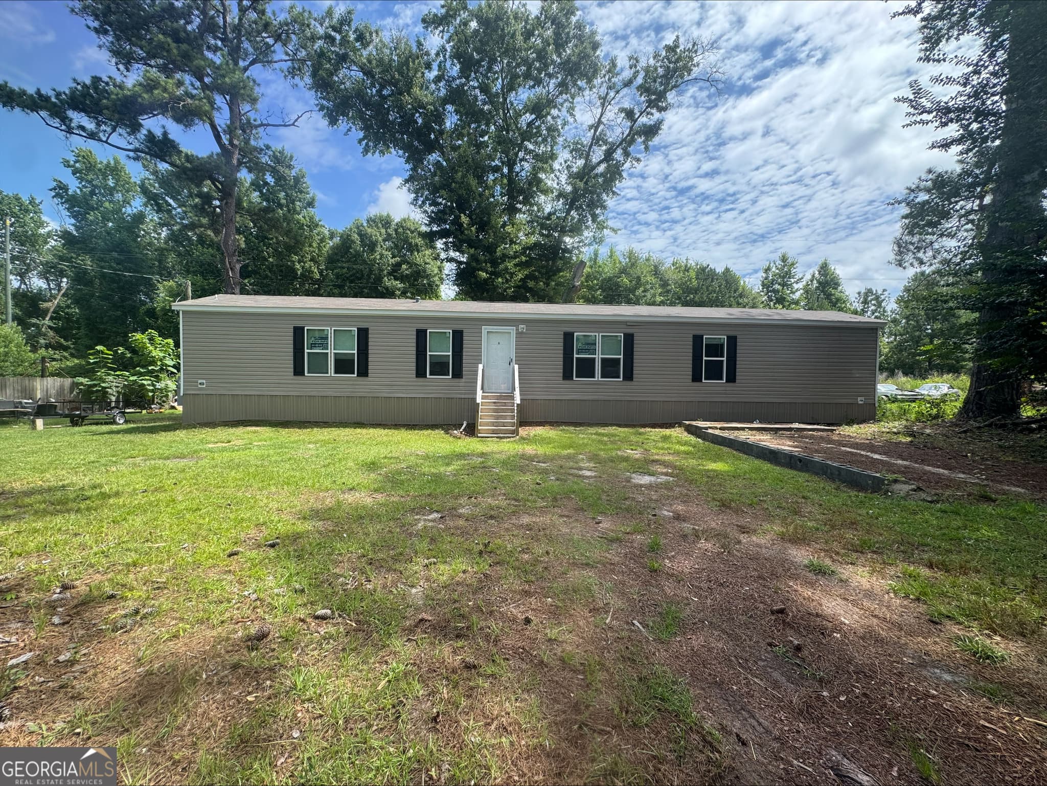 3 bedroom, 2 bathroom, 1,216 sq ft manufactured home,single family residence for sale at 128 Jacqueline Drive, Georgetown, GA 39854 — photo 1 of 26