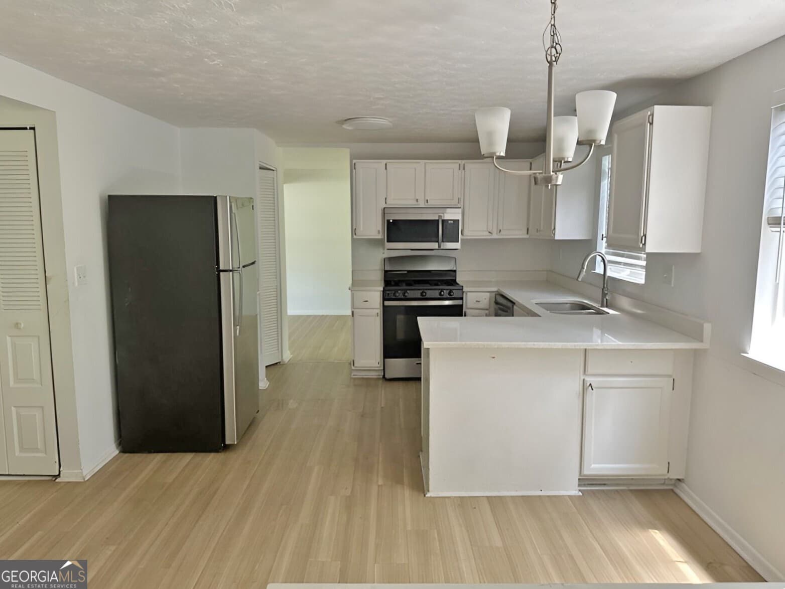 3 bedroom, 2.5 bathroom, 1,799 sq ft single family residence for sale at 1906 Madras Court, Lithonia, GA 30058 — photo 8