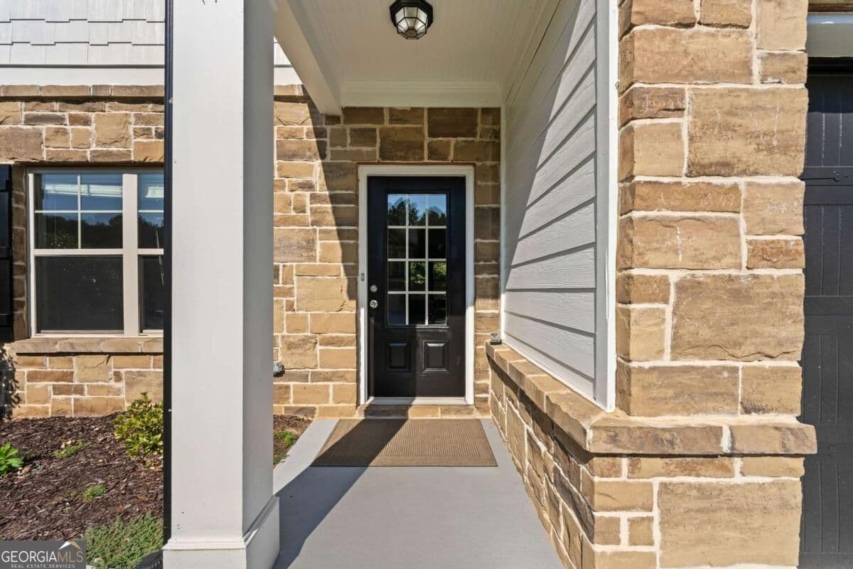 4 bedroom, 2.5 bathroom, 2,610 sq ft single family residence for sale at 7491 Silk Tree Pointe, Braselton, GA 30517 — photo 2