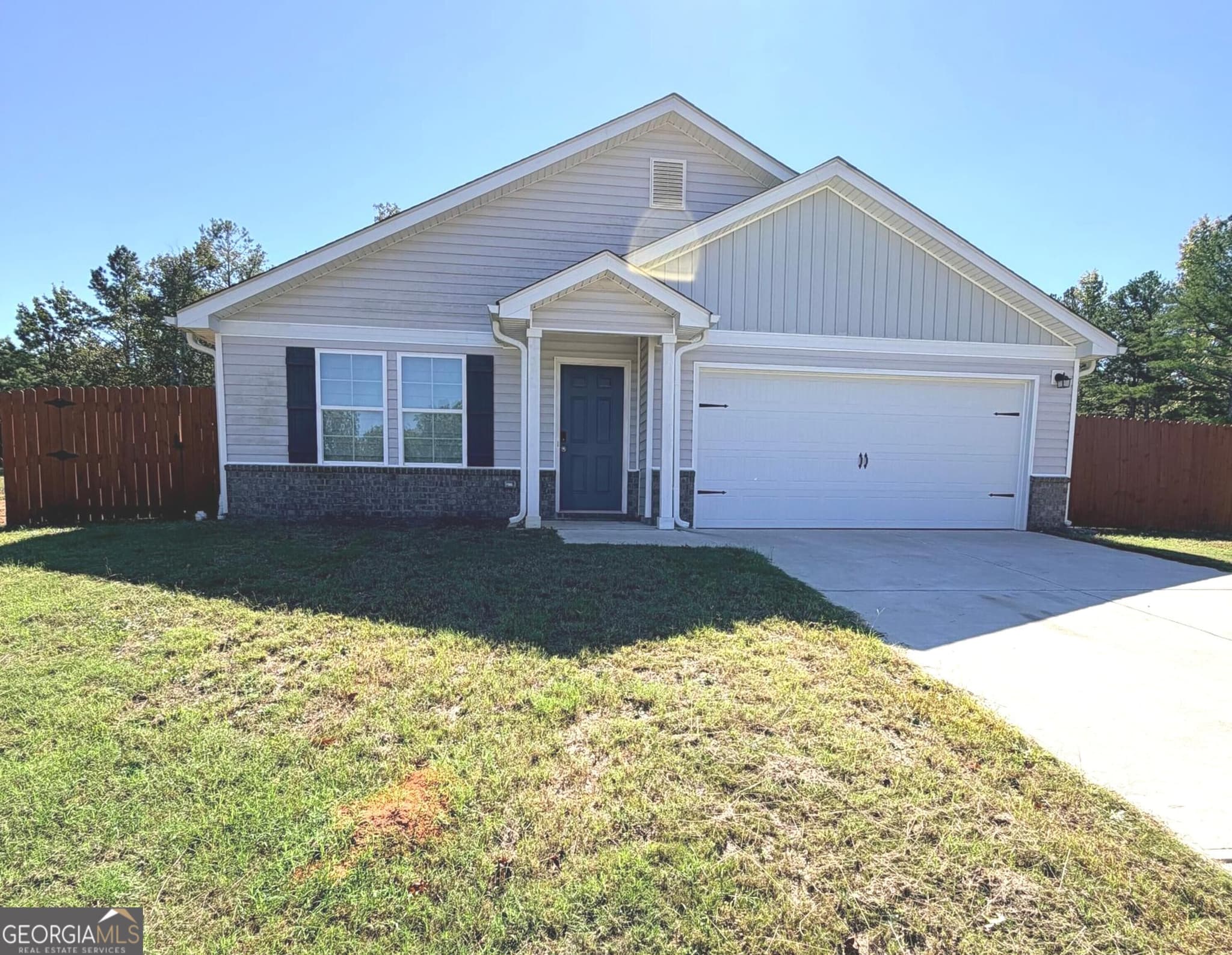 4 bedroom, 2 bathroom, 1,676 sq ft single family residence for sale at 100 Red Oak Drive, Barnesville, GA 30204 — photo 1 of 21