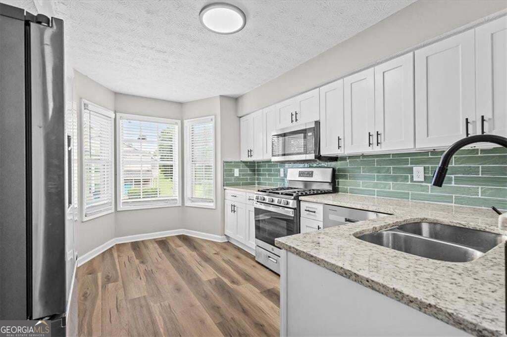 3 bedroom, 2 bathroom, 1,597 sq ft condominium for sale at 9462 Cypress Lane, Jonesboro, GA 30238 — photo 6