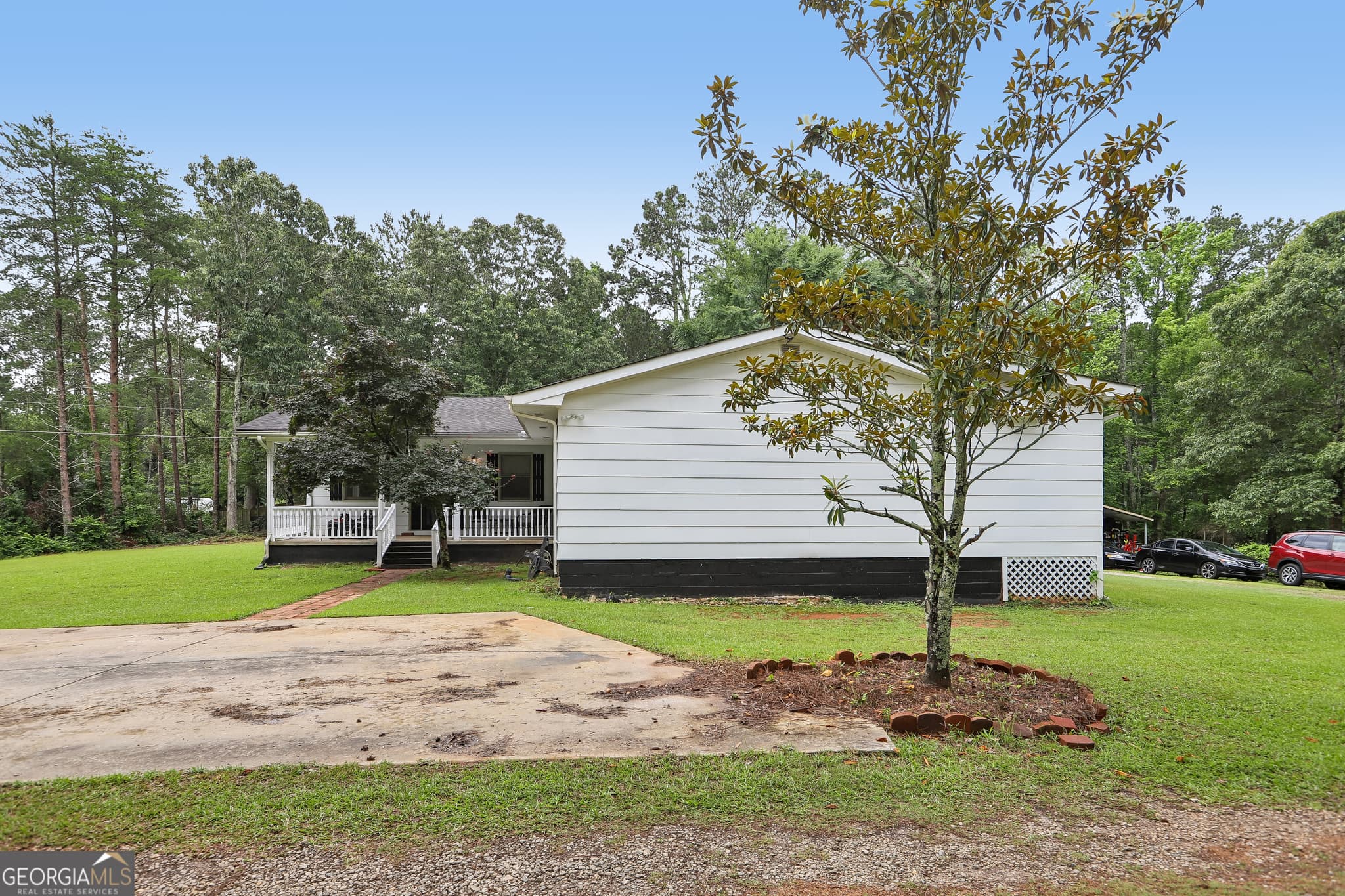 3 bedroom, 2 bathroom, 2,561 sq ft single family residence for sale at 5115 Highway 20, Covington, GA 30016 — photo 2