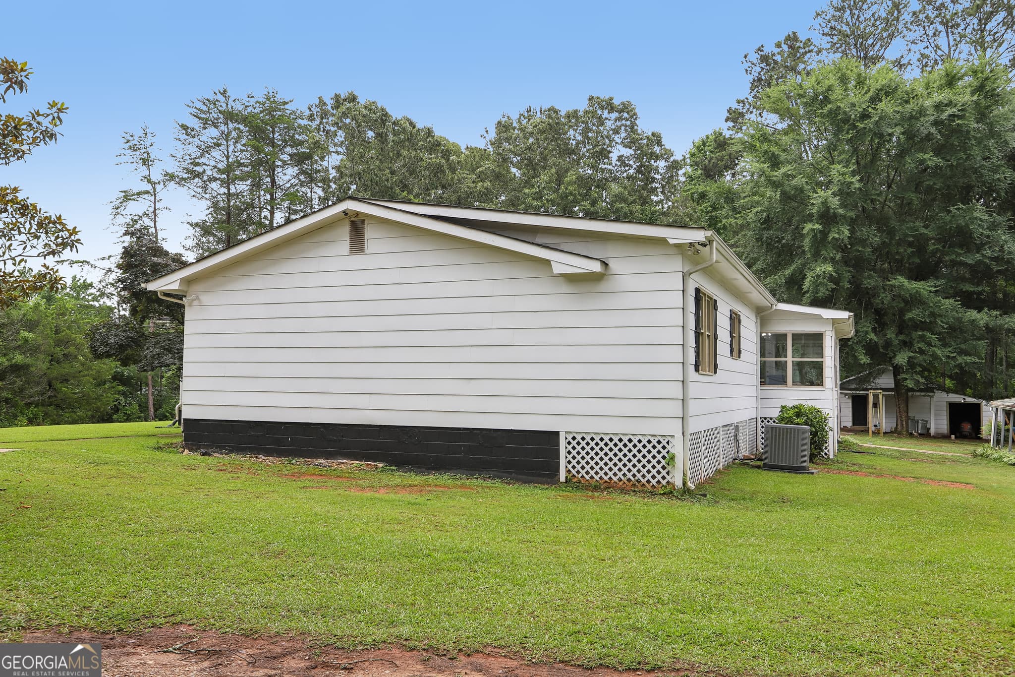 3 bedroom, 2 bathroom, 2,561 sq ft single family residence for sale at 5115 Highway 20, Covington, GA 30016 — photo 3