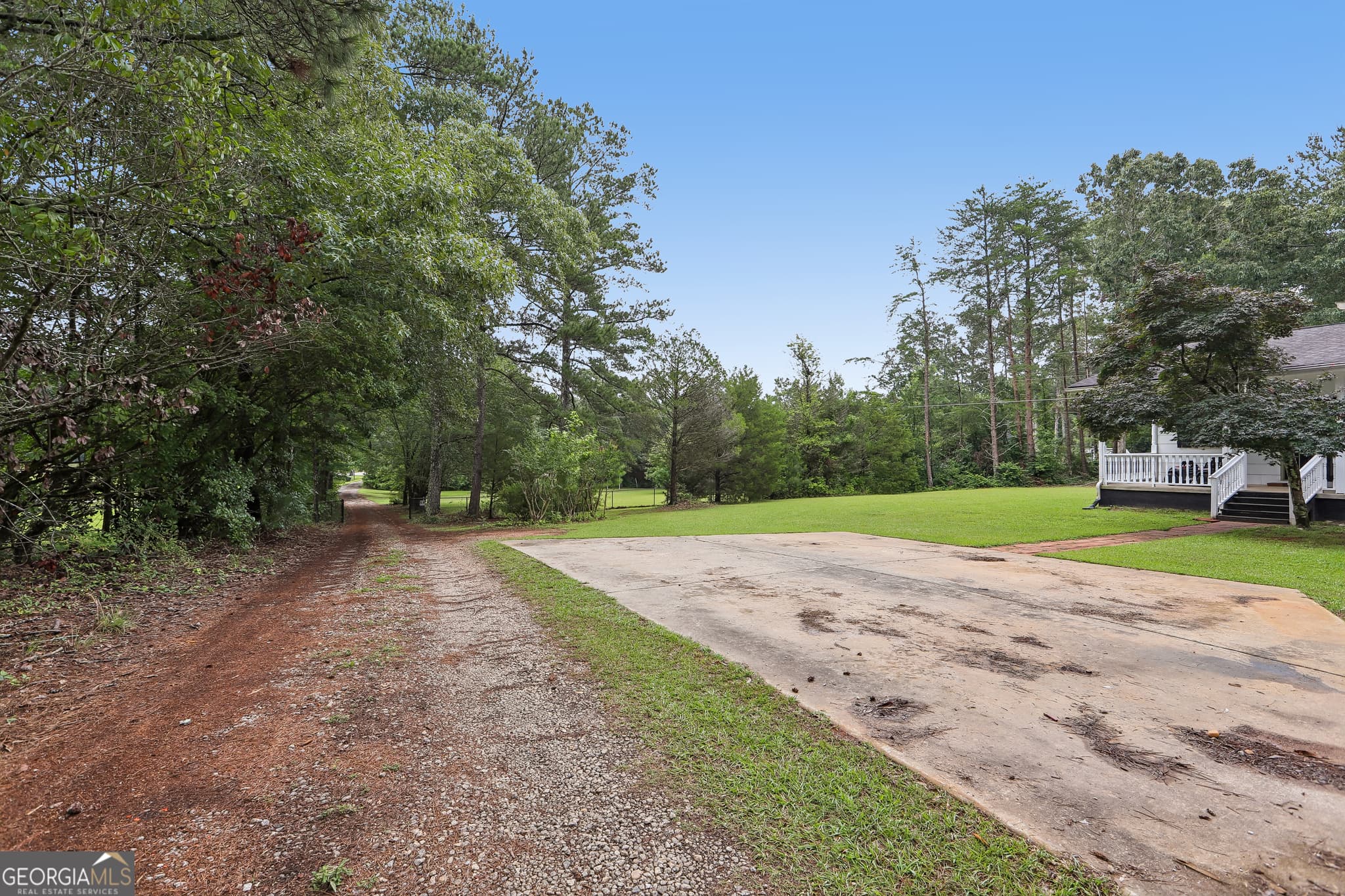 3 bedroom, 2 bathroom, 2,561 sq ft single family residence for sale at 5115 Highway 20, Covington, GA 30016 — photo 4