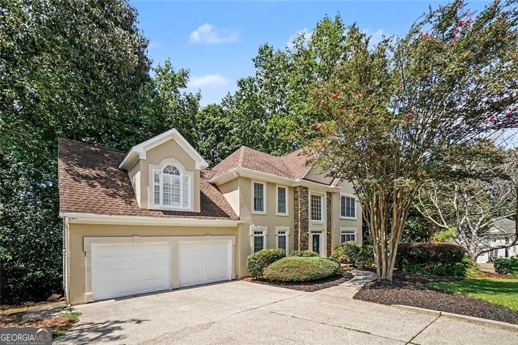5 bedroom, 3.5 bathroom, 4,857 sq ft single family residence for sale at 3407 Fairway Court, Woodstock, GA 30189 — photo 2