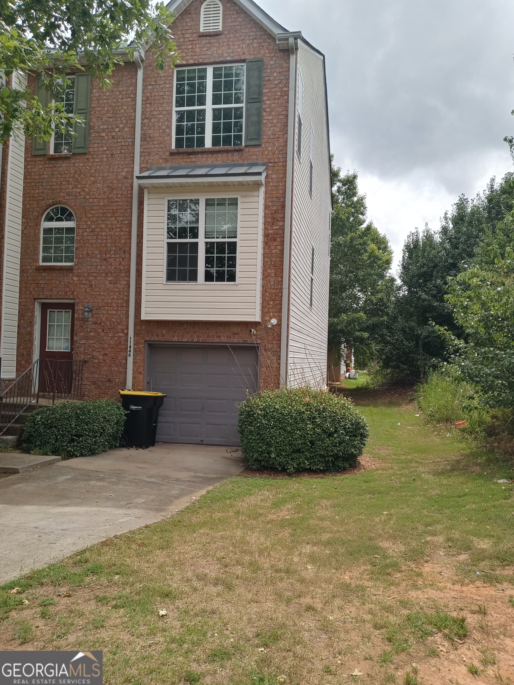 4 bedroom, 3.5 bathroom, 1,236 sq ft townhouse for sale at 11446 Ashefield Lane, Hampton, GA 30228 — photo 1 of 8