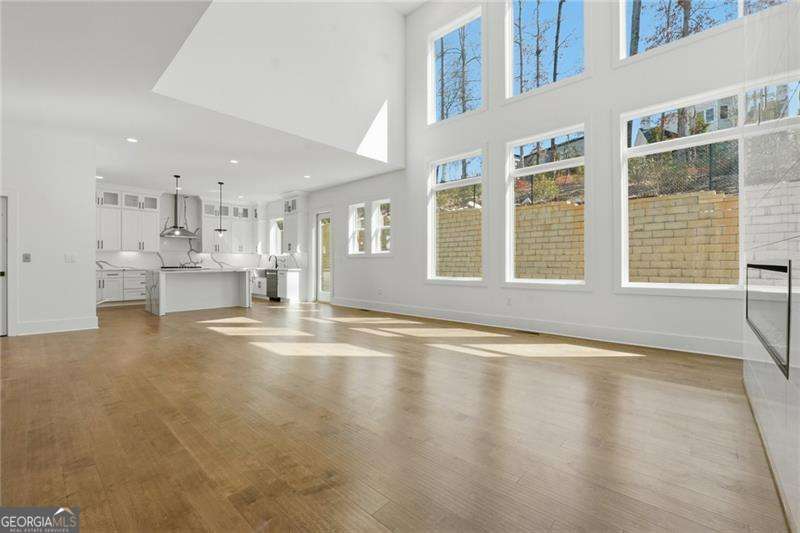5 bedroom, 4 bathroom, 3,026 sq ft single family residence for sale at 3915 Clifton Hill Court, Cumming, GA 30040 — photo 2