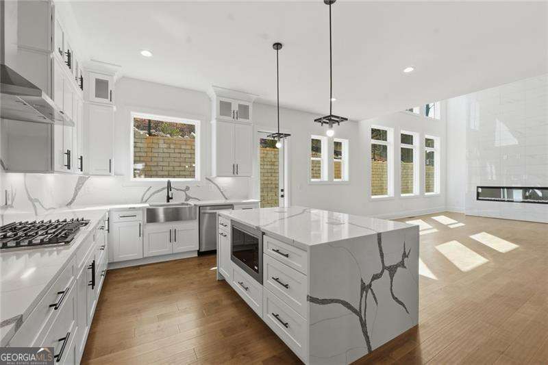 5 bedroom, 4 bathroom, 3,026 sq ft single family residence for sale at 3915 Clifton Hill Court, Cumming, GA 30040 — photo 7