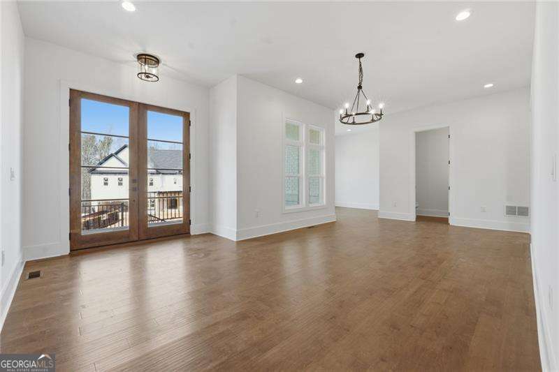 5 bedroom, 4 bathroom, 3,026 sq ft single family residence for sale at 3915 Clifton Hill Court, Cumming, GA 30040 — photo 4