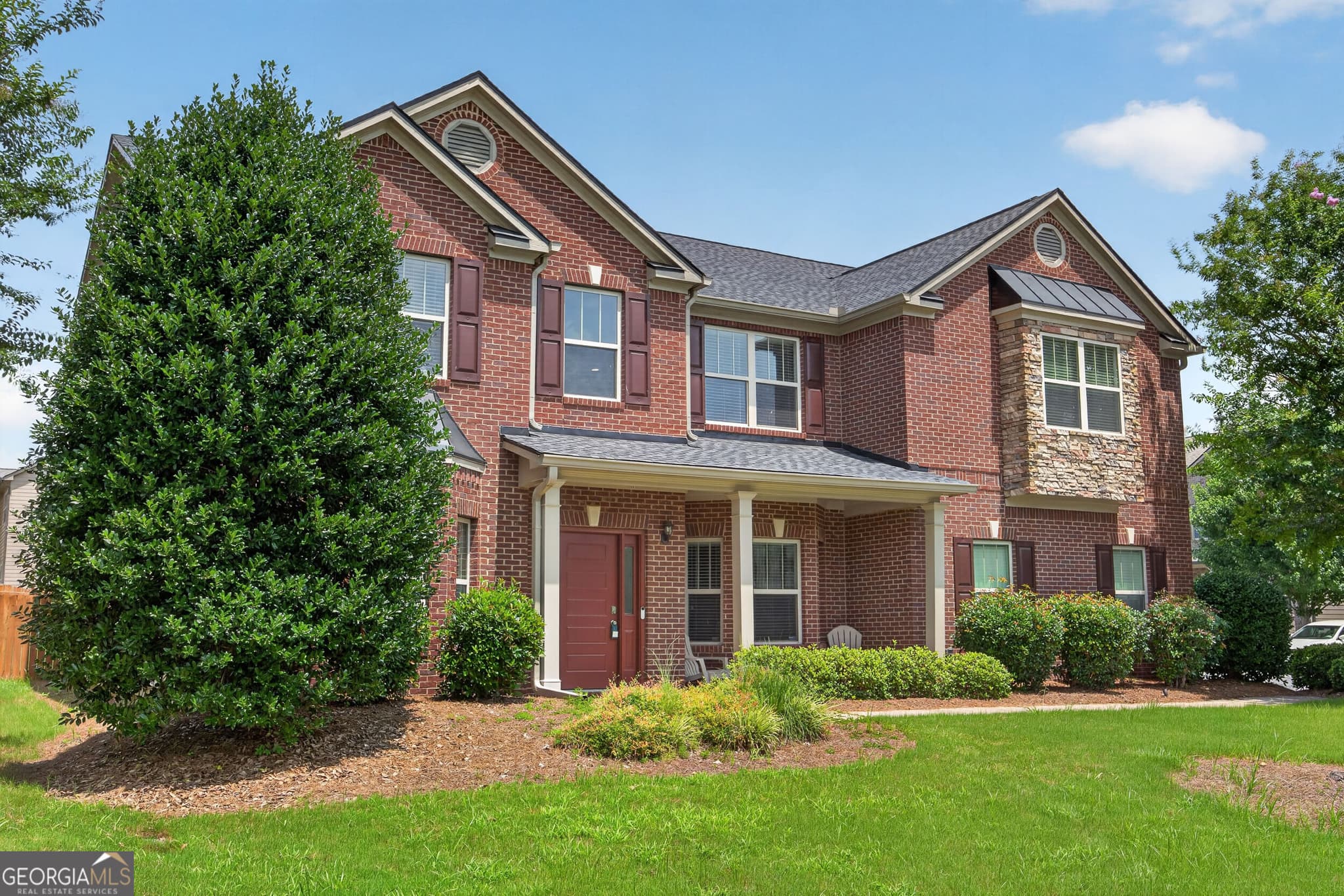 5 bedroom, 4 bathroom, 4,956 sq ft cabin,single family residence for sale at 3831 Lake Haven Way, Atlanta, GA 30349 — photo 2