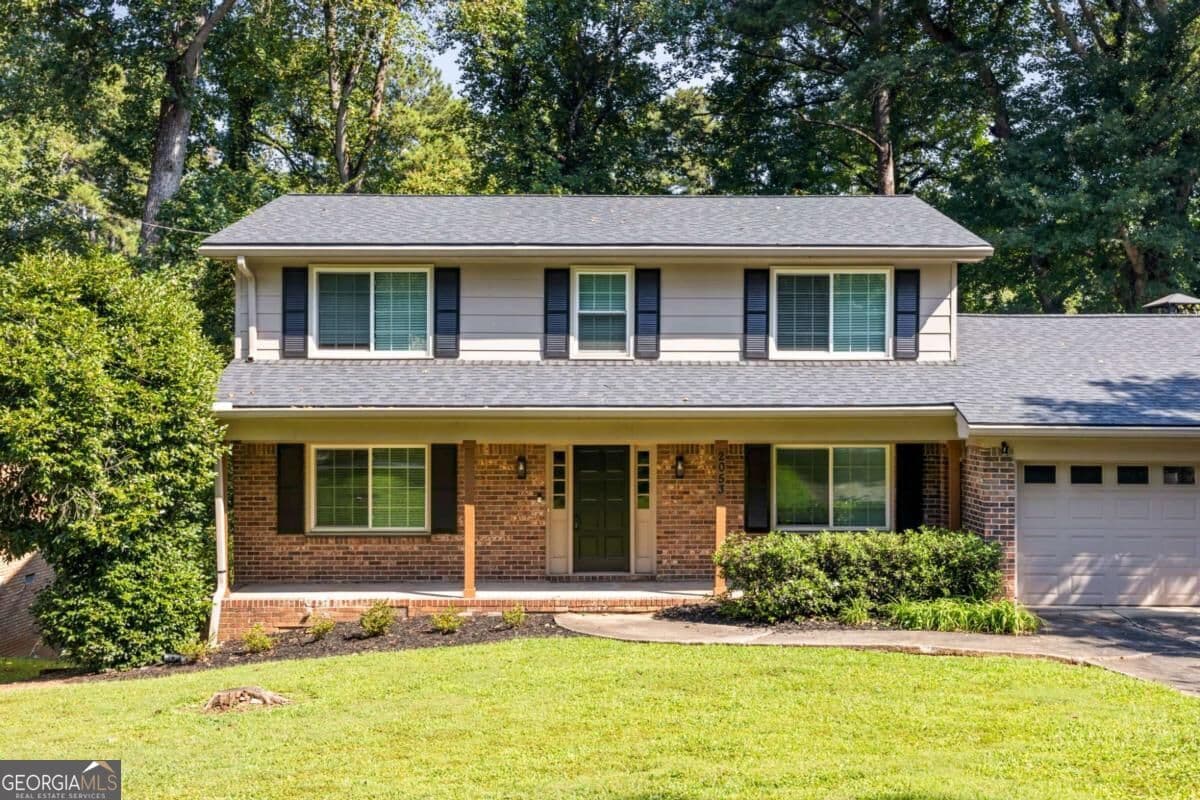 4 bedroom, 3 bathroom, 2,352 sq ft single family residence for sale at 2053 Carthage Road, Tucker, GA 30084 — photo 2