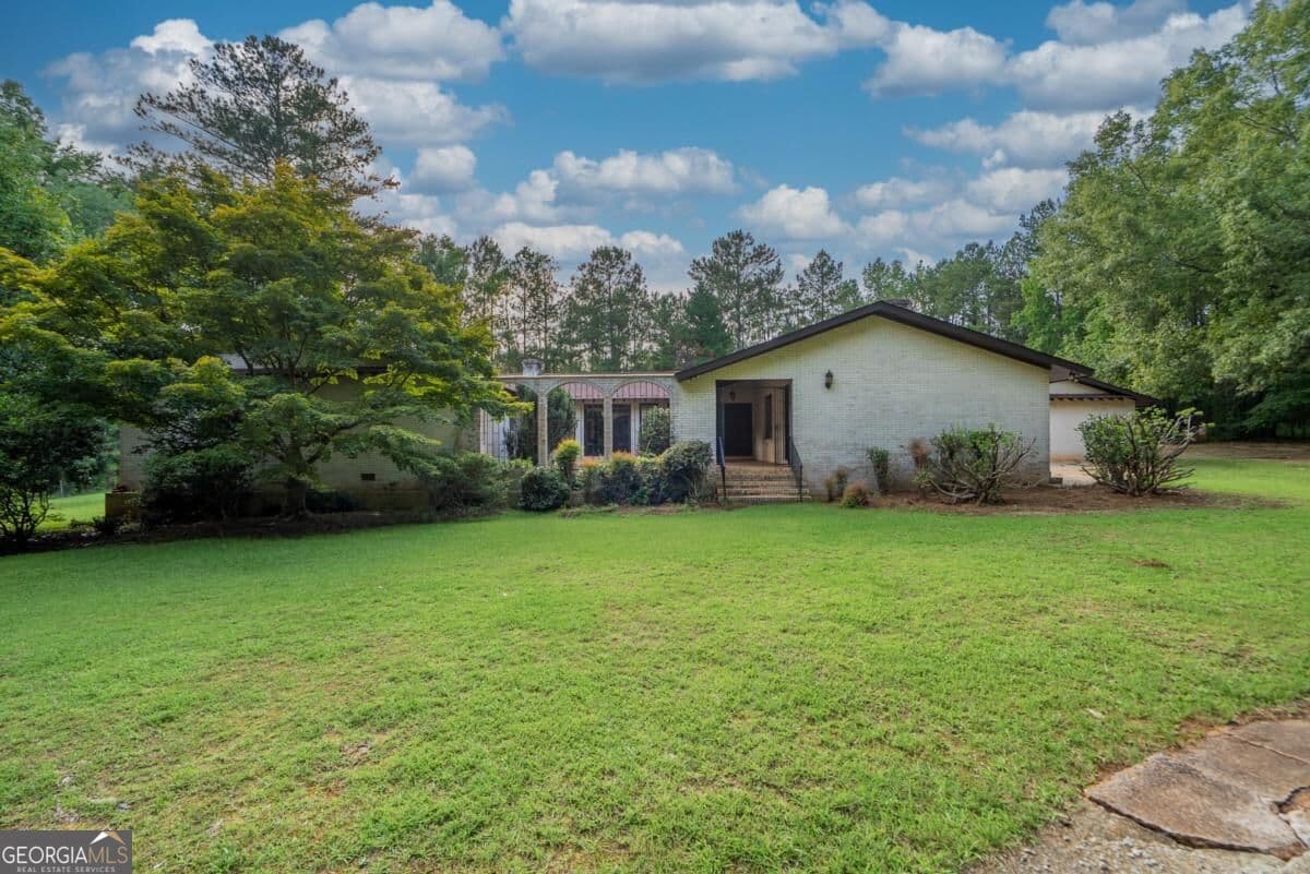 4 bedroom, 2.5 bathroom, 3,532 sq ft single family residence for sale at 882 GAISSERT CHURCH Road, Sparta, GA 31087 — photo 1 of 59