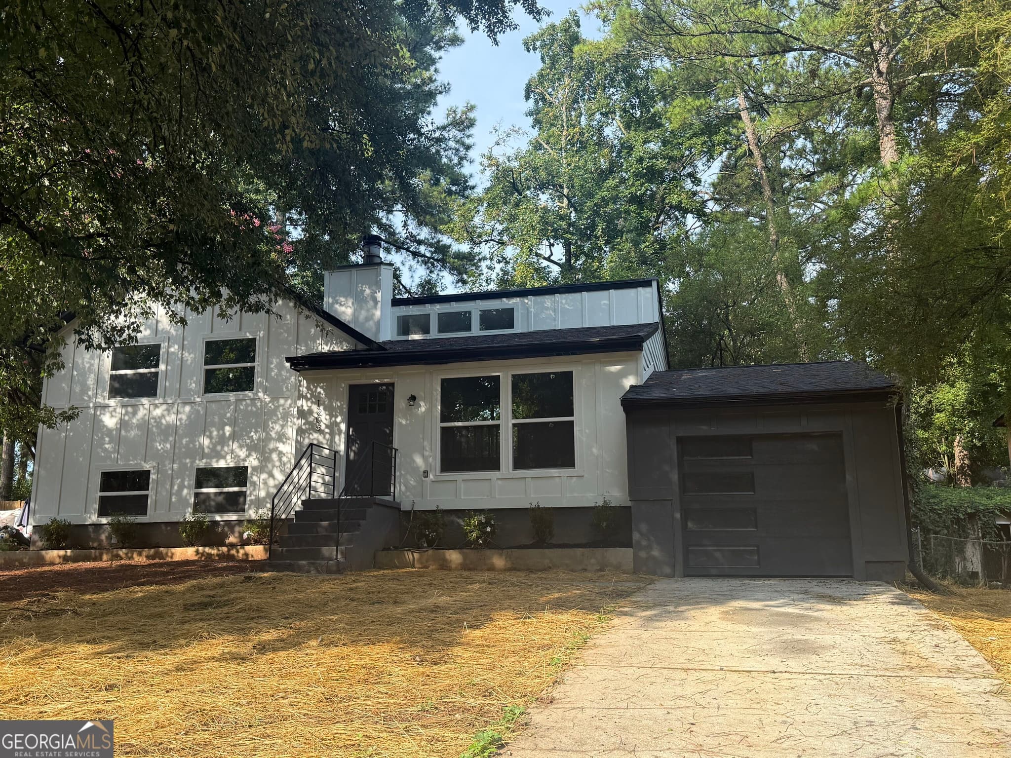 4 bedroom, 3 bathroom, 2,120 sq ft single family residence for rent at 1205 Brockdell Court, Norcross, GA 30093 for $2,600 a month — photo 1 of 16